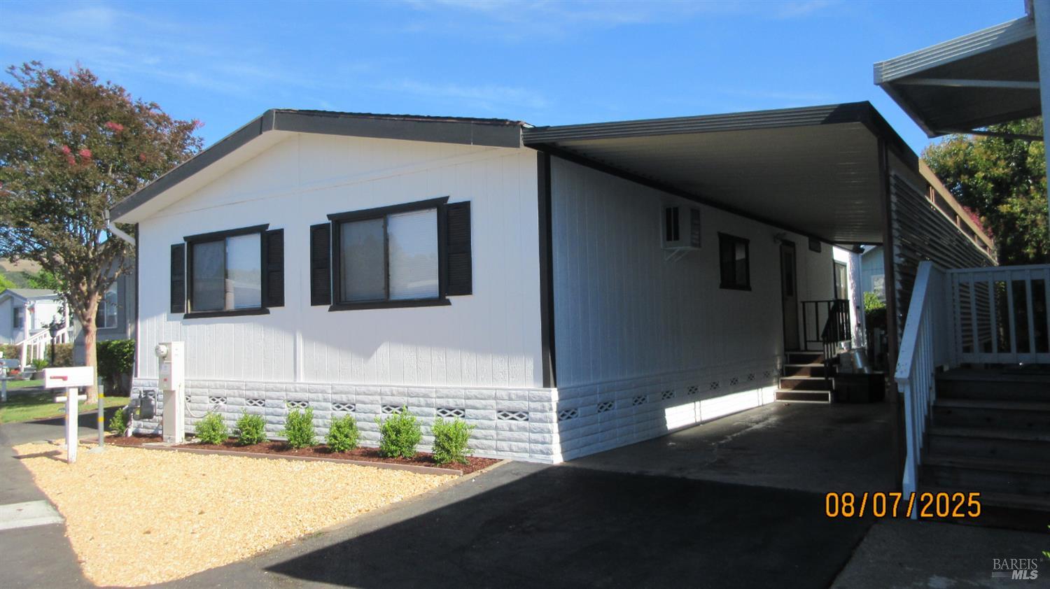 190 Apple Lane Santa Rosa, CA 95407 - Photo 1 of 15 a front view of a house with garage