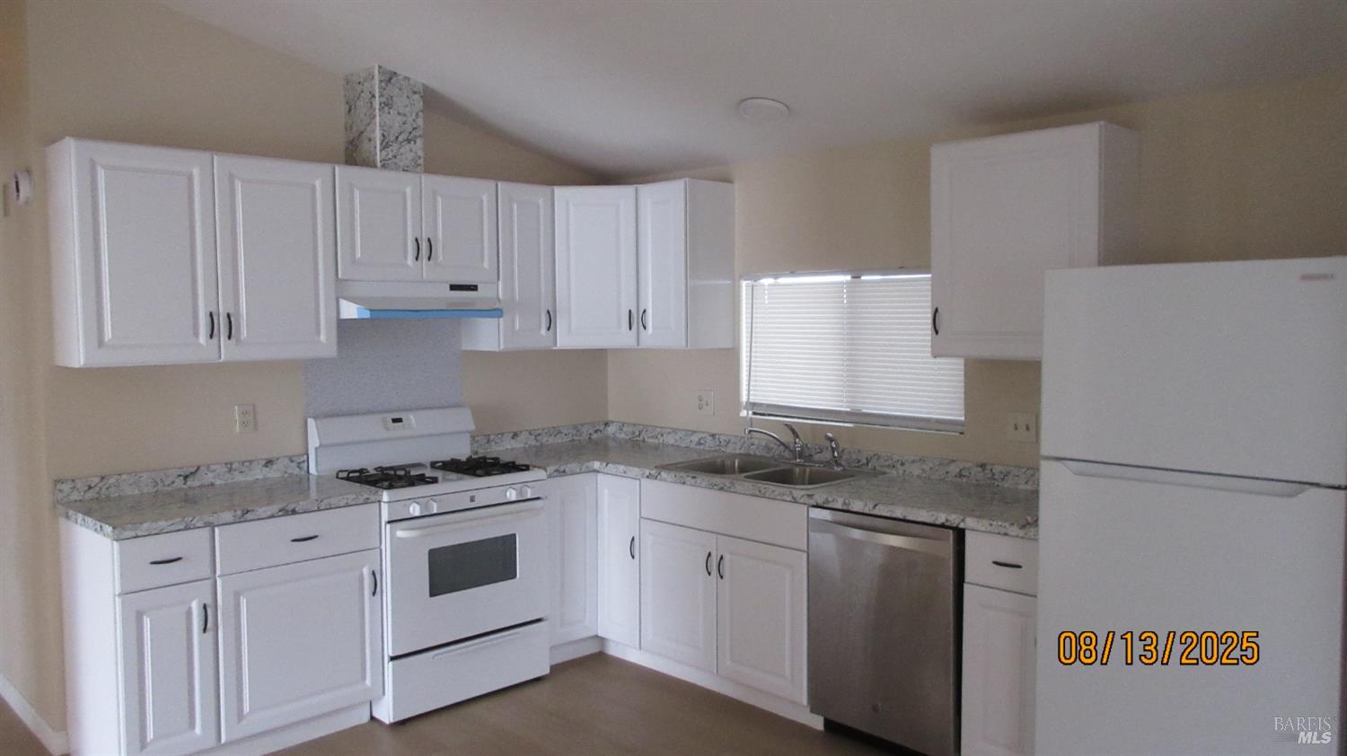 190 Apple Lane Santa Rosa, CA 95407 - Photo 11 of 15 a kitchen with granite countertop white cabinets and white appliances