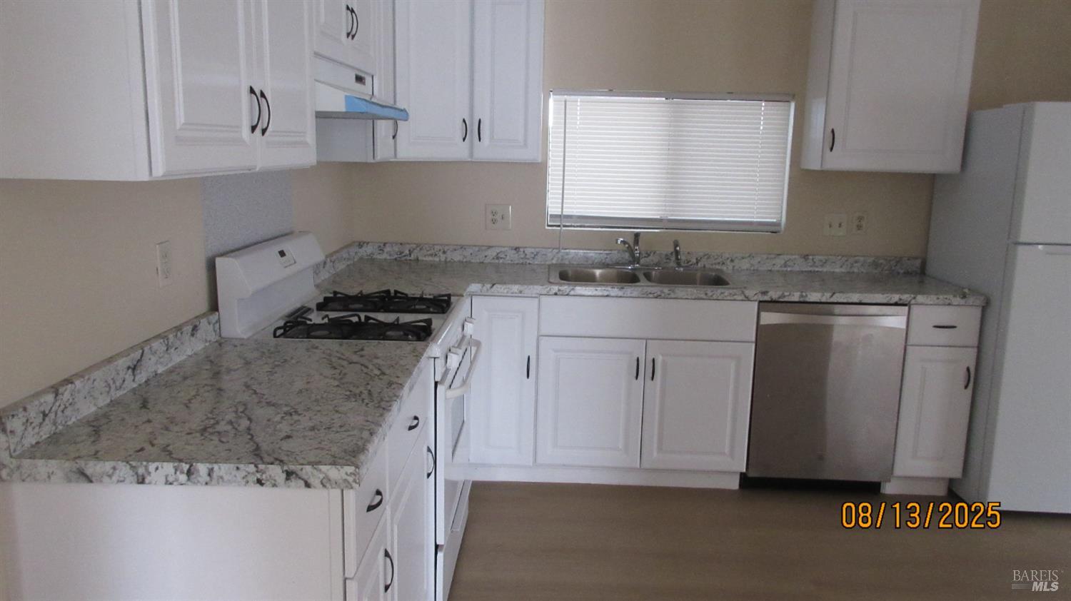 190 Apple Lane Santa Rosa, CA 95407 - Photo 10 of 15 a kitchen with granite countertop cabinets stainless steel appliances and a counter space