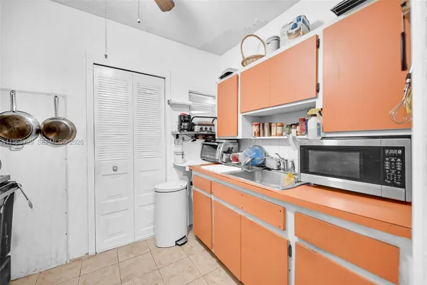 a kitchen with stainless steel appliances a stove and a refrigerator