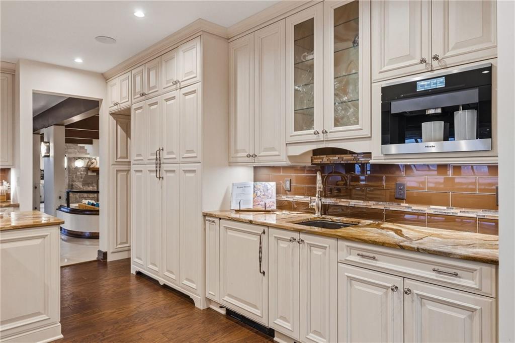 514 Justabout Road Venetia, PA 15367 - Photo 21 of 50 a kitchen with stainless steel appliances granite countertop a refrigerator and white cabinets