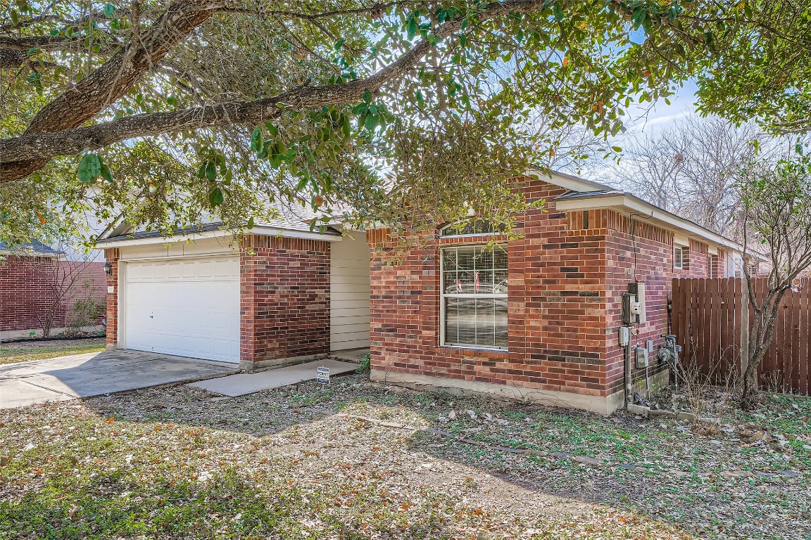 1101 Tudor House Road Pflugerville, TX 78660 - Photo 23 of 32 Traditional red brick