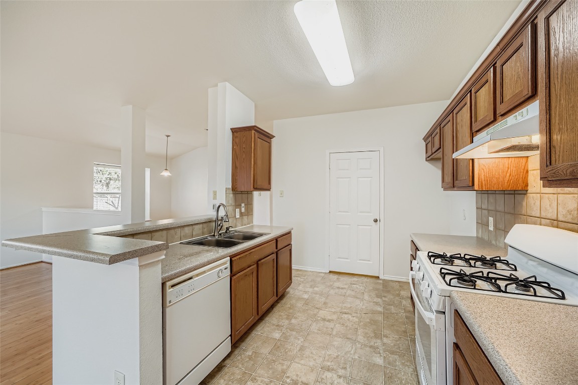 1101 Tudor House Road Pflugerville, TX 78660 - Photo 8 of 32 Kitchen open to living