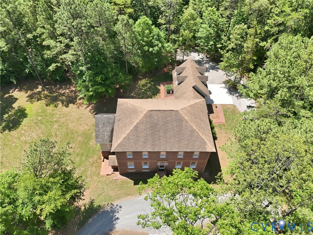 13173 Scotchtown Road Beaverdam, VA 23015 - Photo 5 of 65 an aerial view of a house with swimming pool and large trees