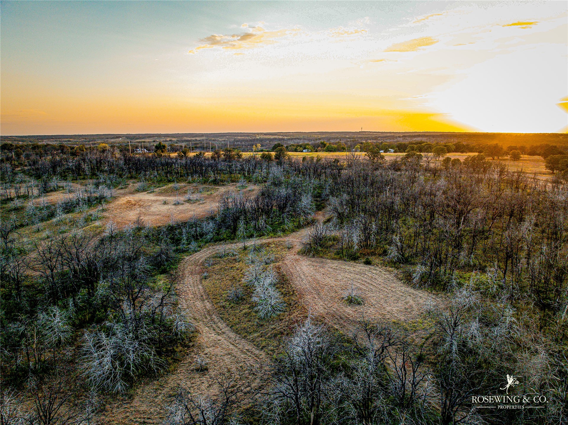 Seward Road East Meridian, OK 73058 - Photo 26 of 26 Expansive land with varied topography, featuring natural vegetation and cleared areas