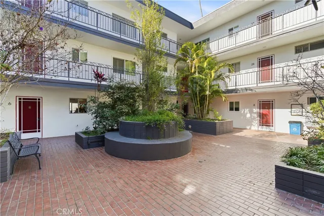 a view of a house with a garden