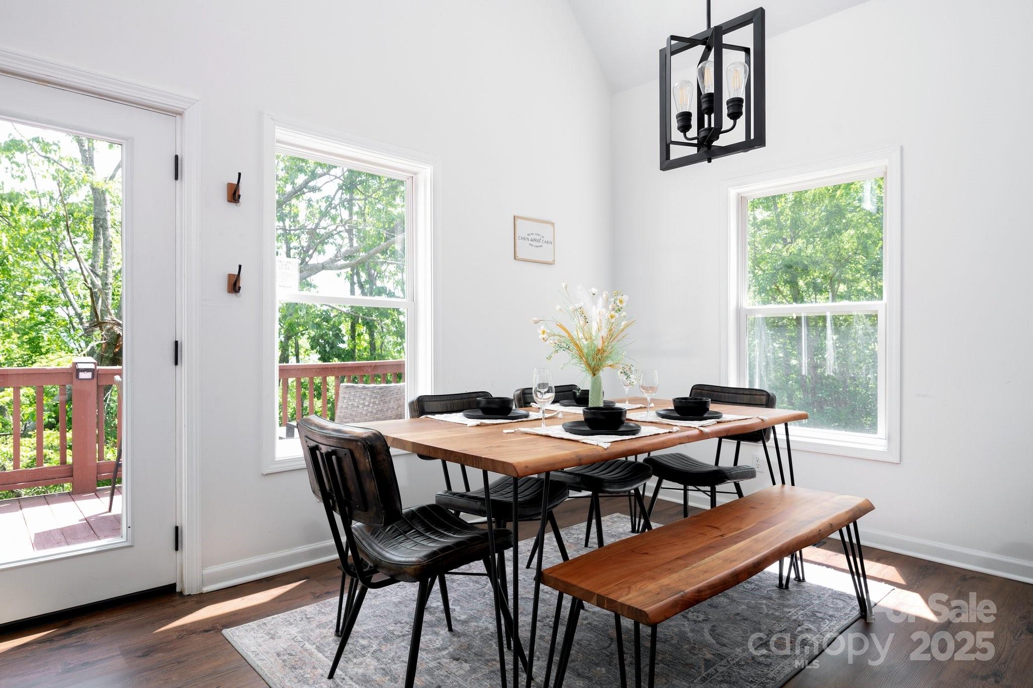 25 Lick Log Ridge Fairview, NC 28730 - Photo 12 of 34 a view of a dining room with furniture and a window