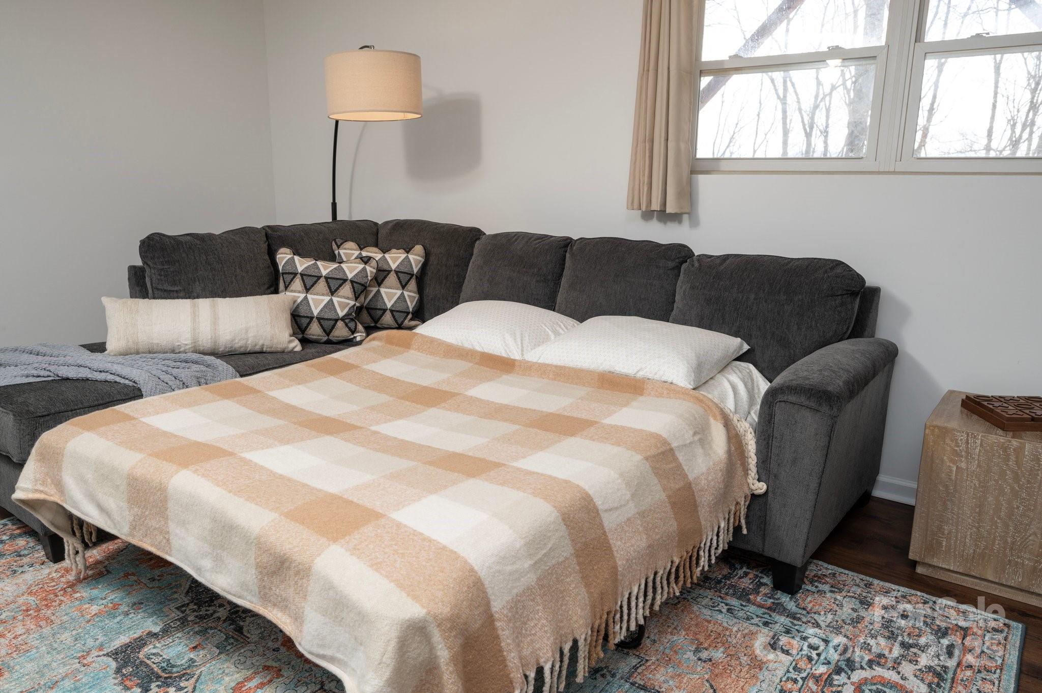 25 Lick Log Ridge Fairview, NC 28730 - Photo 28 of 34 a bedroom with bed and window