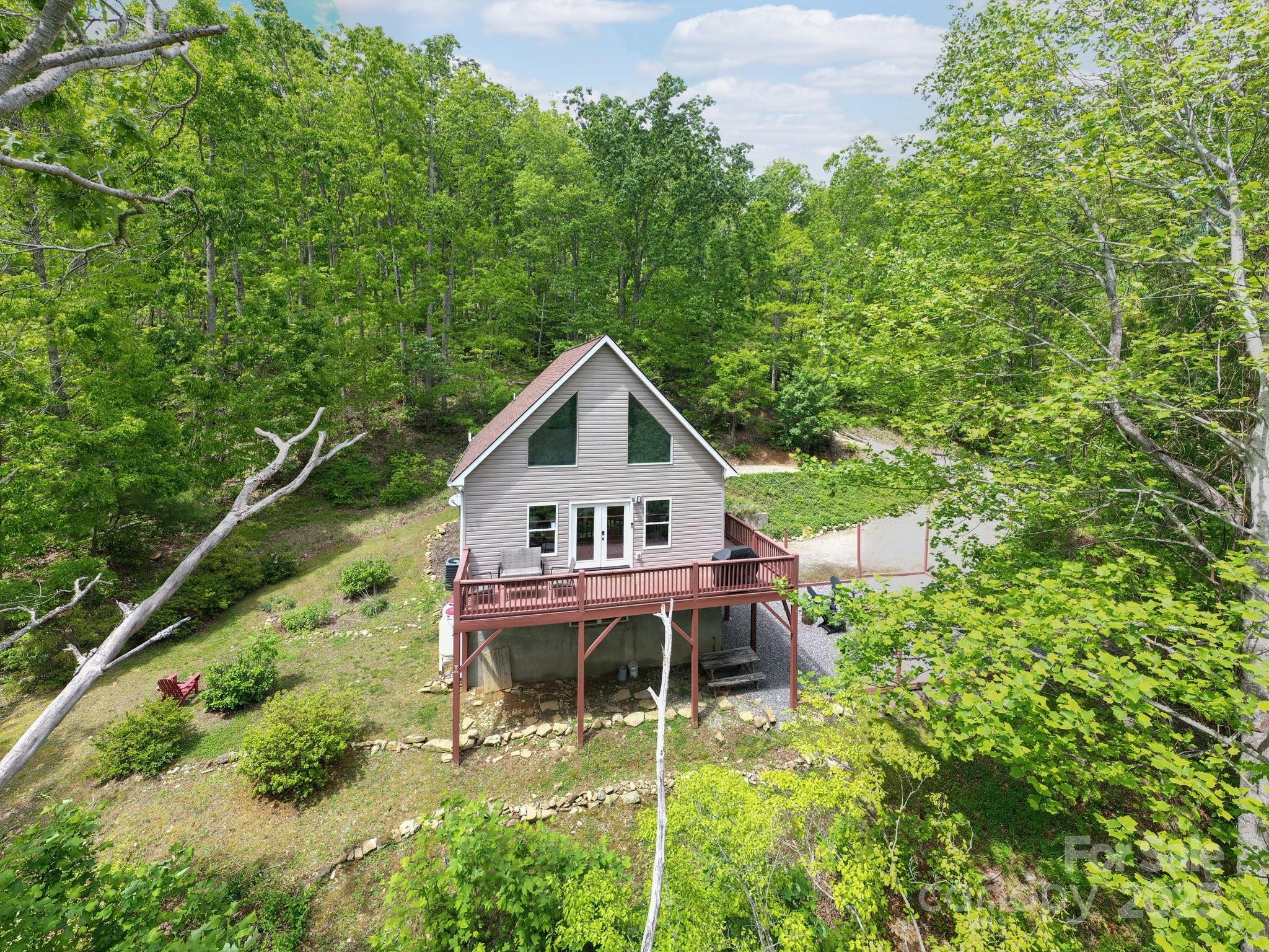 25 Lick Log Ridge Fairview, NC 28730 - Photo 33 of 34 a house view with a garden space