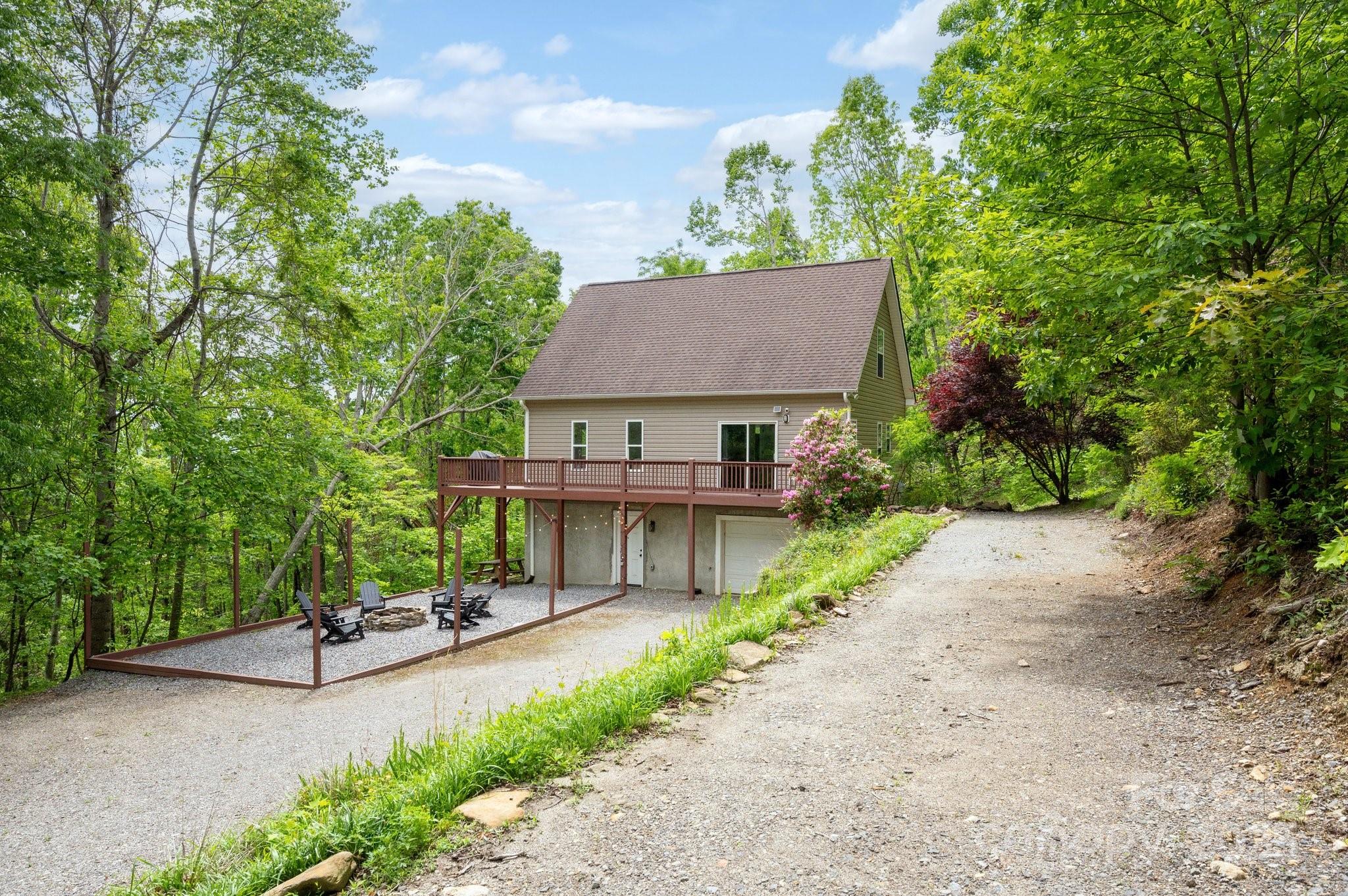 25 Lick Log Ridge Fairview, NC 28730 - Photo 7 of 34 a view of house and outdoor space