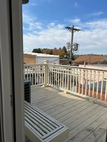 a view of a balcony with an outdoor space