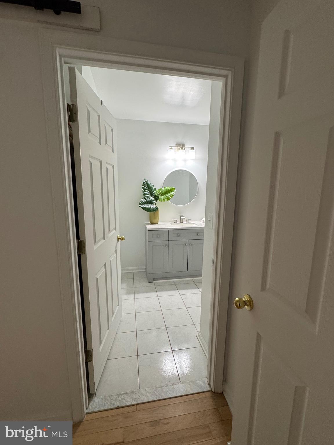 18310 Feathertree Way, Unit 101 Montgomery Village, MD 20886 - Photo 27 of 31 a view of front door