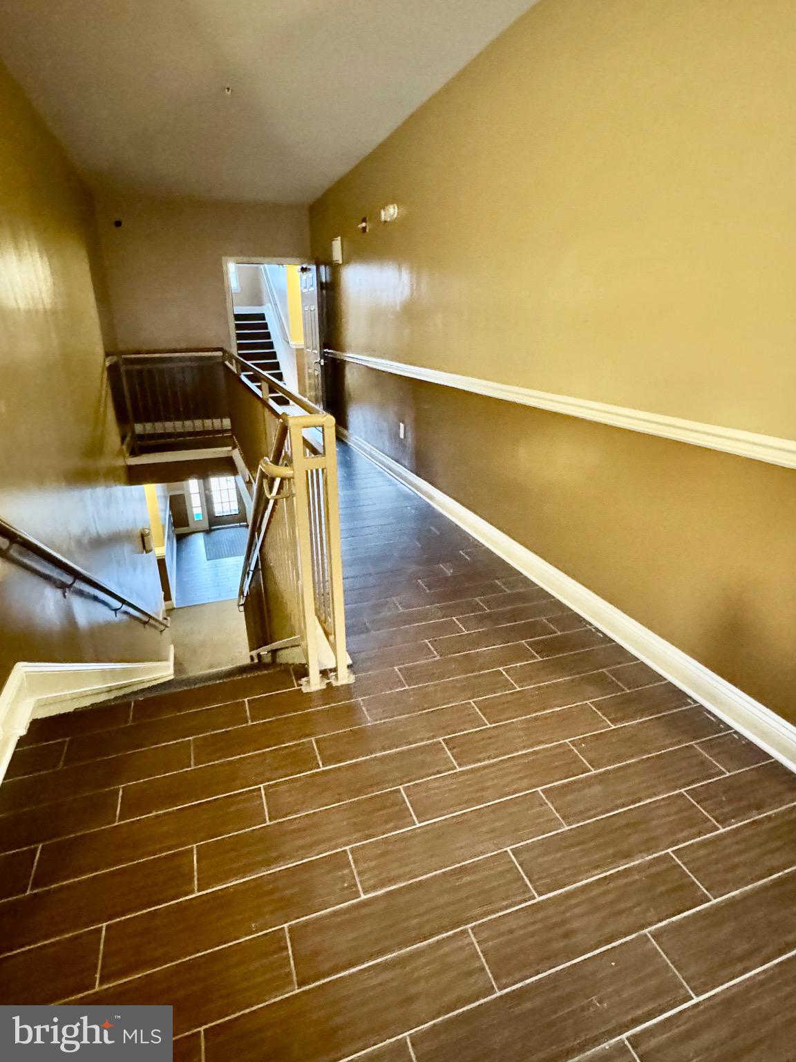 18310 Feathertree Way, Unit 101 Montgomery Village, MD 20886 - Photo 5 of 31 a view of a room with gym equipment