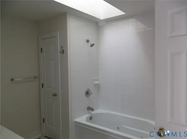 a bathroom with a sink and a bathtub