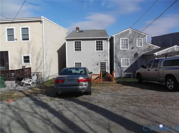 a car parked in front of a house
