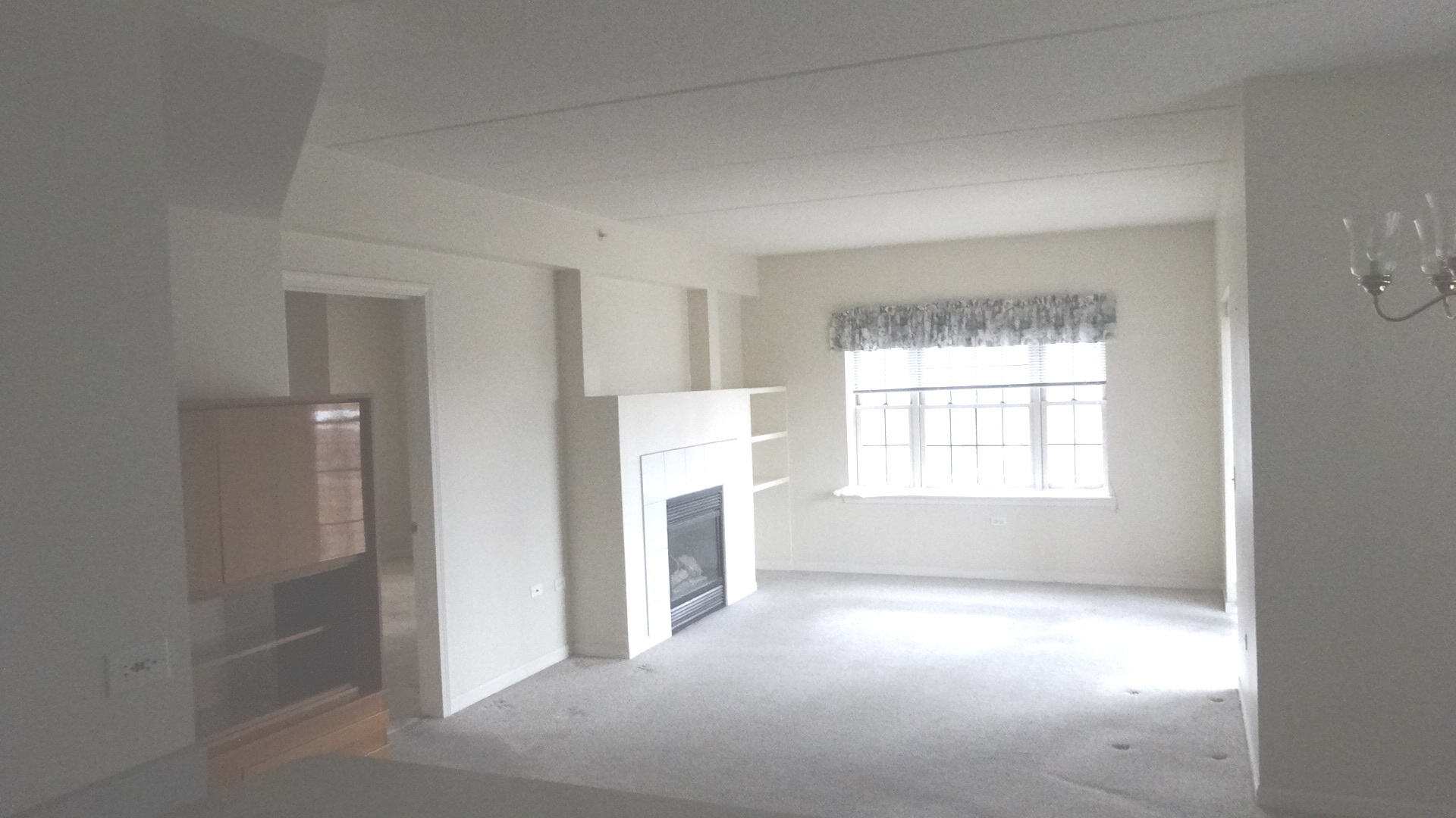 210 North Addison Avenue, Unit 401 Elmhurst, IL 60126 - Photo 19 of 30 an empty room with a empty space and windows
