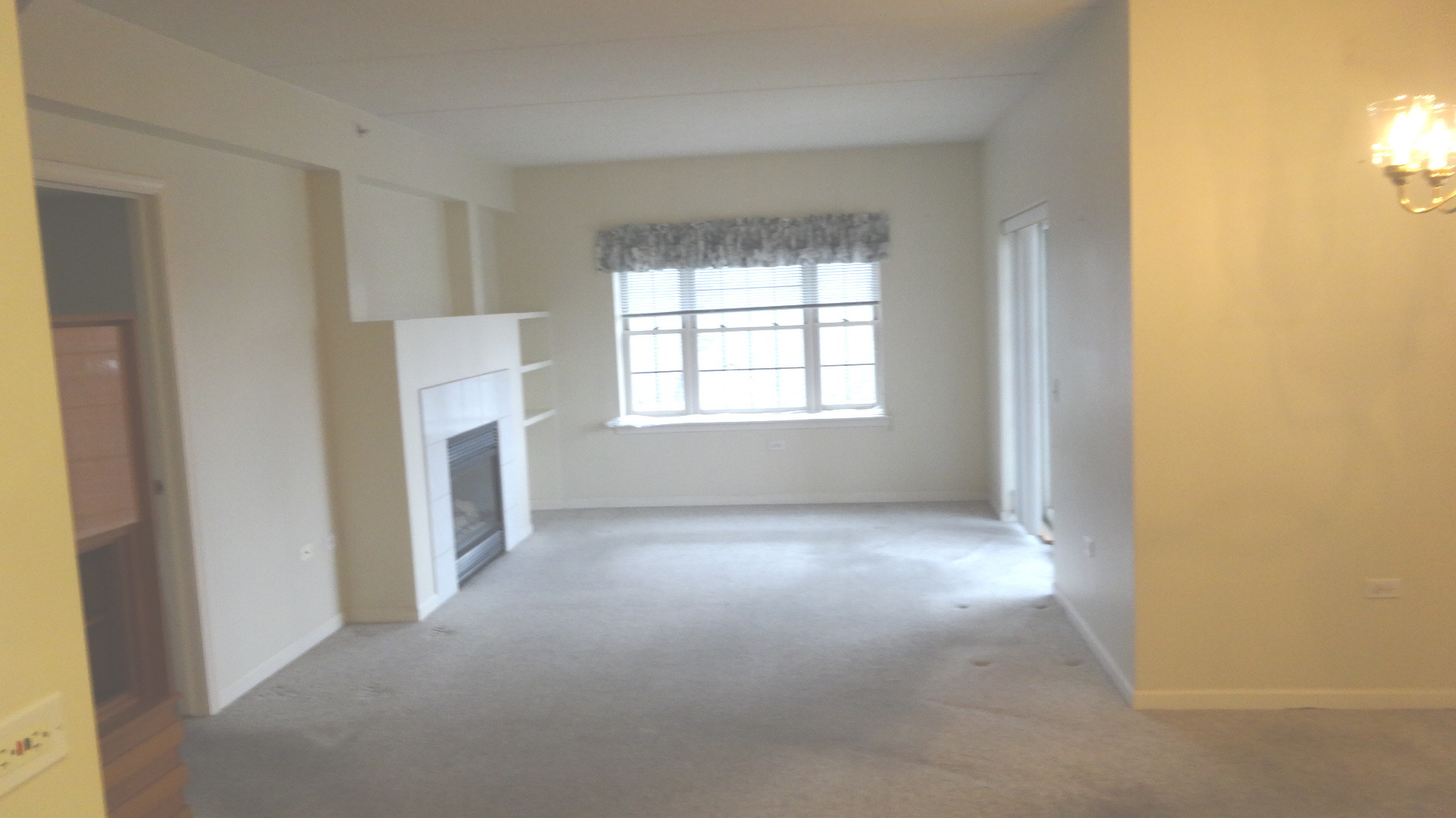 210 North Addison Avenue, Unit 401 Elmhurst, IL 60126 - Photo 22 of 30 an empty room with windows and closet
