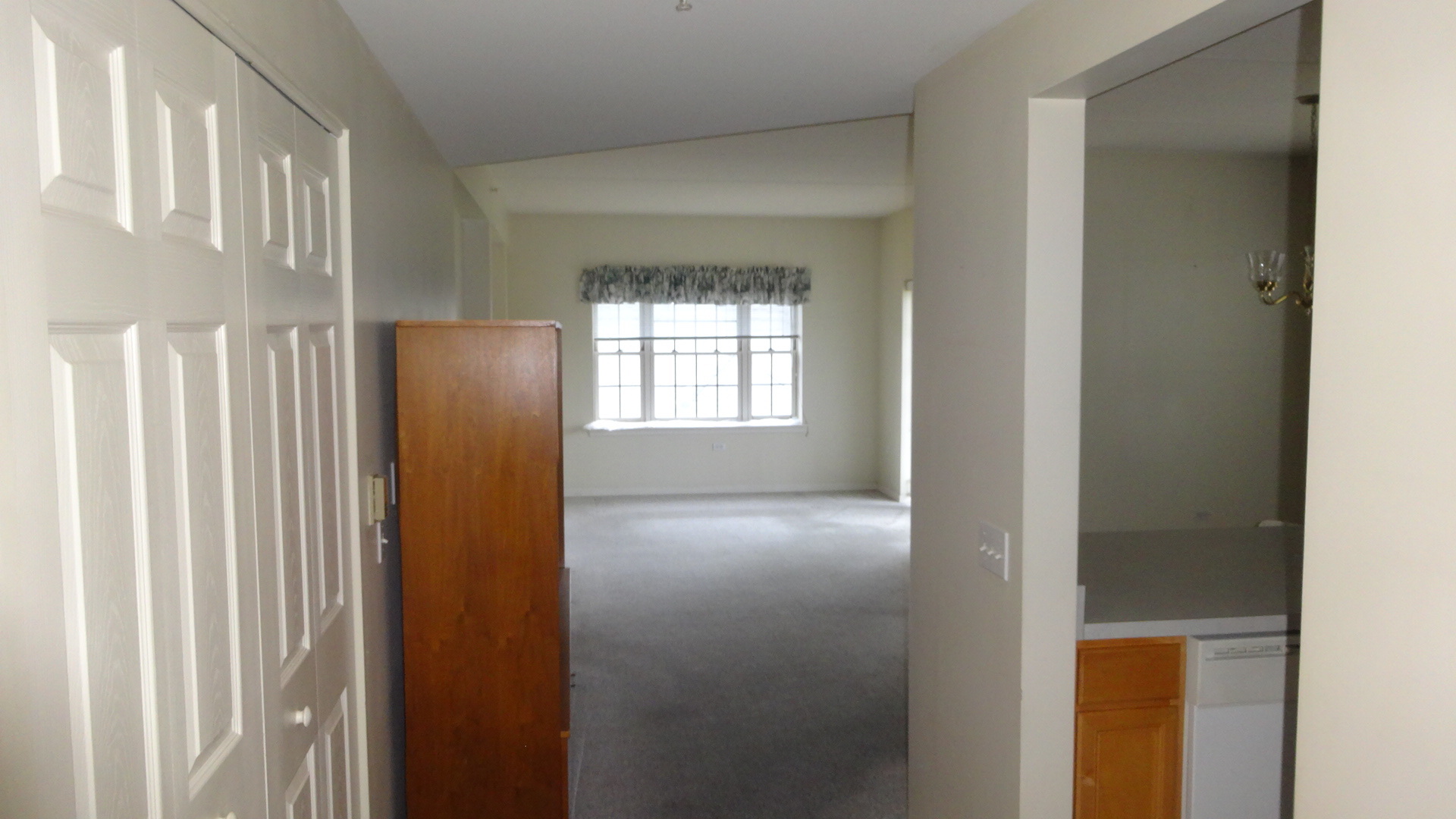 210 North Addison Avenue, Unit 401 Elmhurst, IL 60126 - Photo 9 of 30 a view of empty room with windows