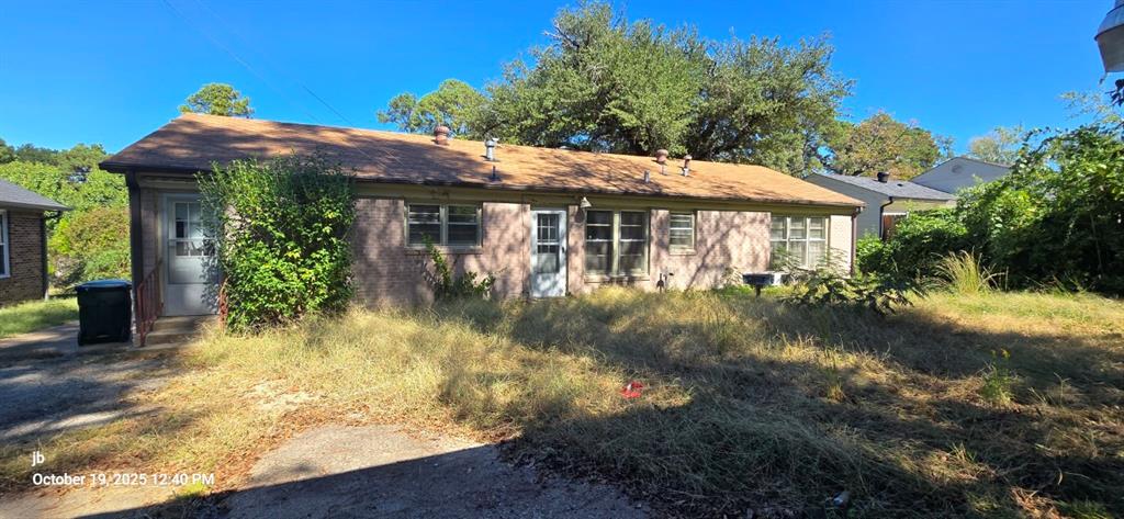 1314 South Azalea Drive Tyler, TX 75701 - Photo 27 of 27 a view of a house with a yard