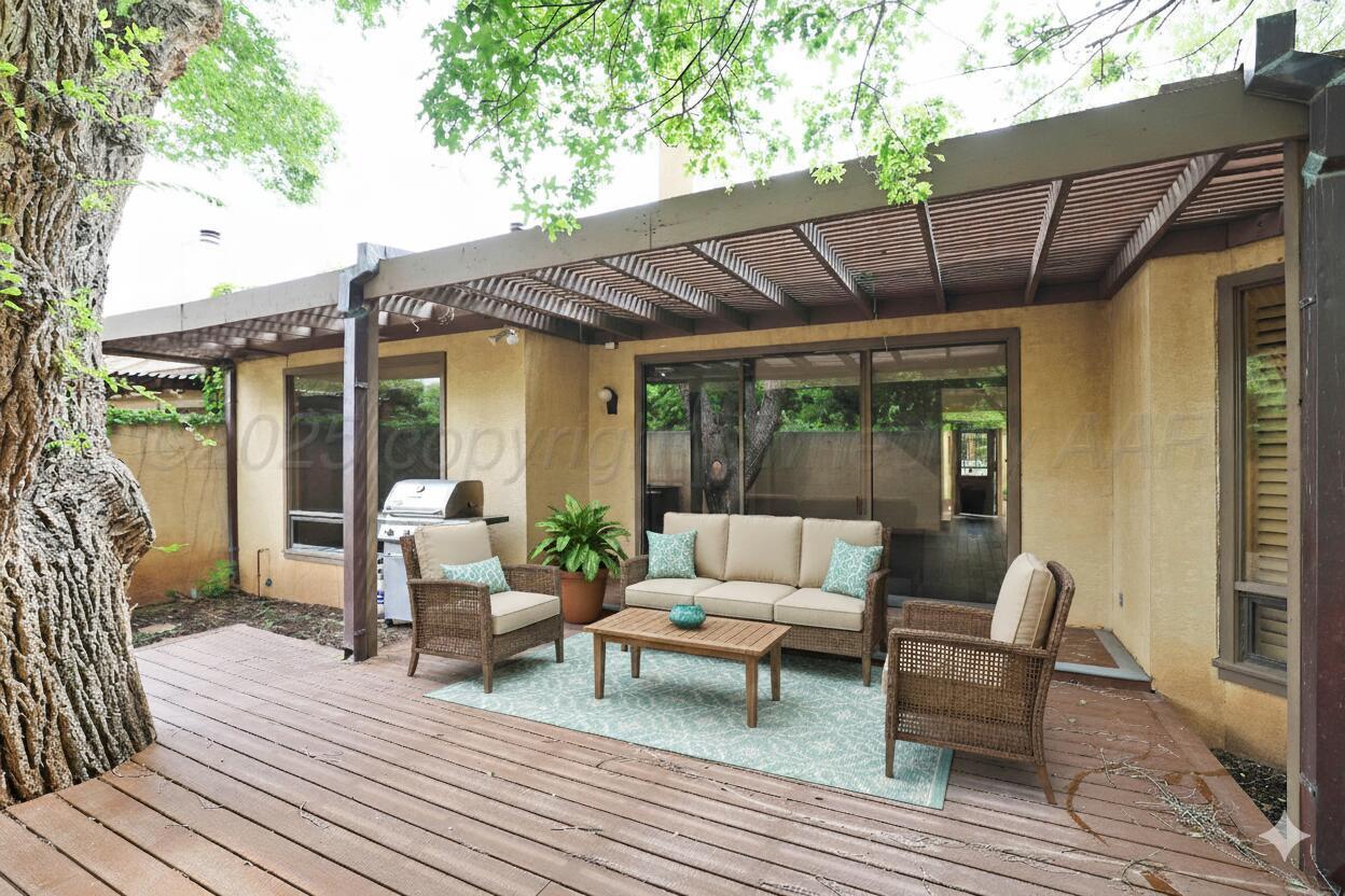 6 Woodstone Street Amarillo, TX 79106 - Photo 32 of 35 a patio with patio outdoor seating and wooden floor