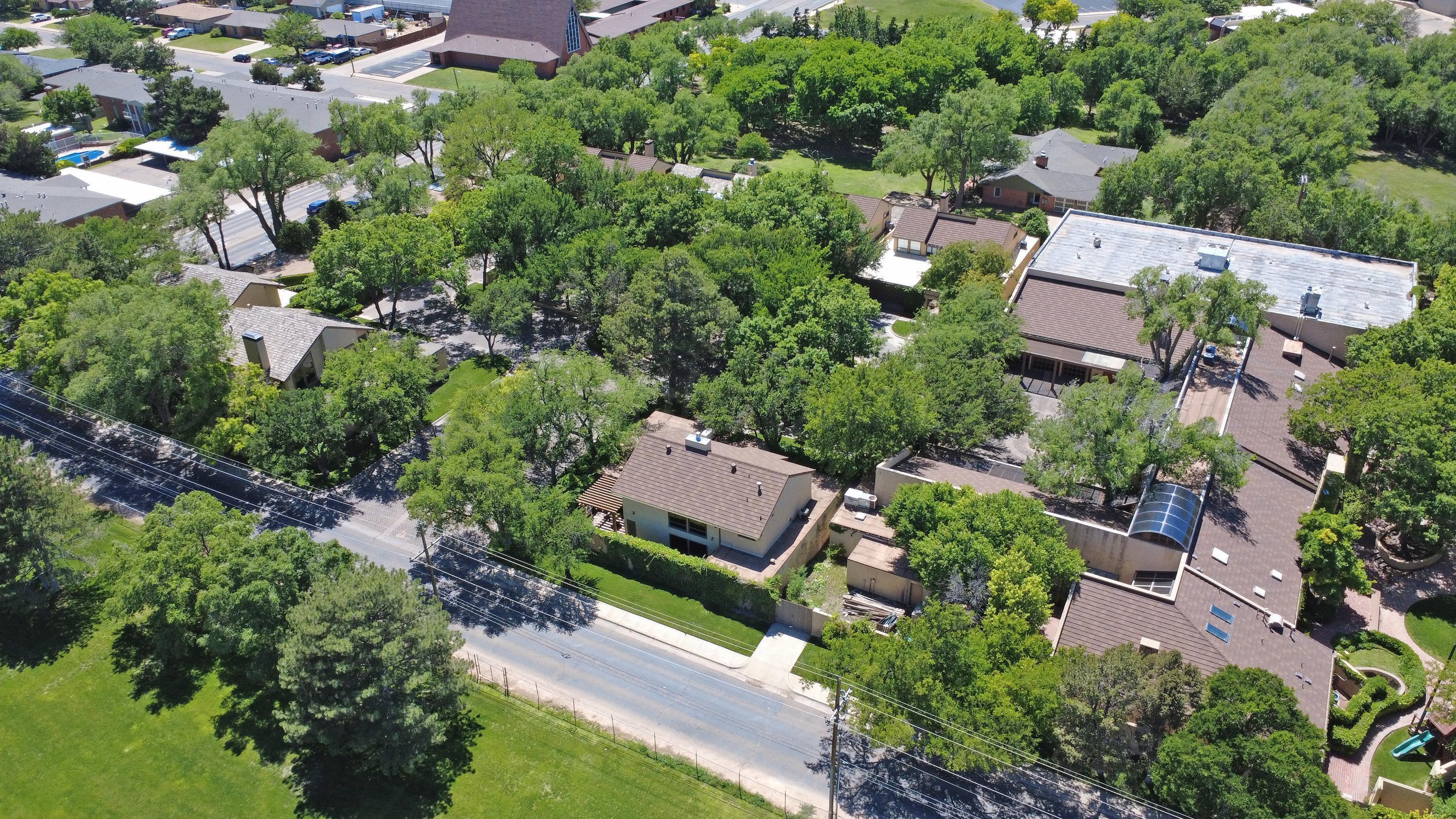 6 Woodstone Street Amarillo, TX 79106 - Photo 5 of 35 an aerial view of a house with a yard