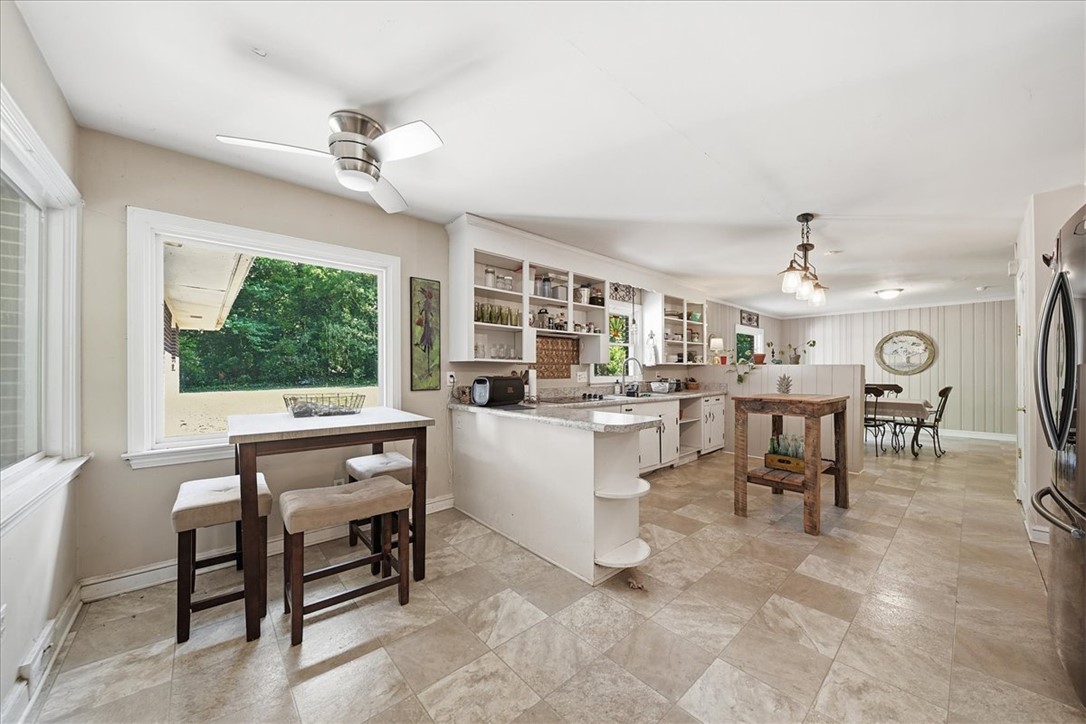 504 Jeb Stuart Avenue Anderson, SC 29621 - Photo 10 of 47 This spacious kitchen offers a bright and functional layout, perfect for everyday living.