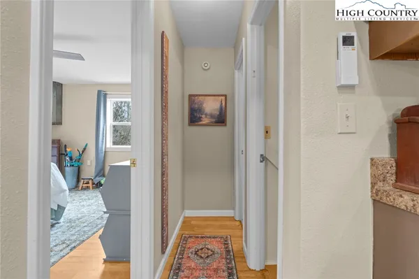 a bed room with a bed and a dresser