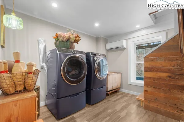 a view of a storage & utility room with washer and dryer