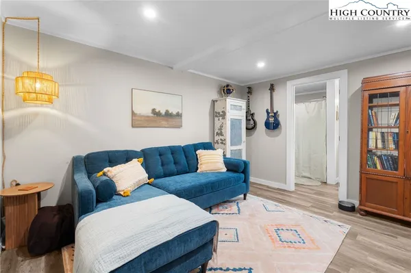 a bed room with a bed and a window