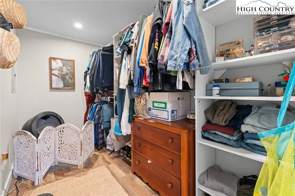 a bathroom with a sink a vanity and a mirror