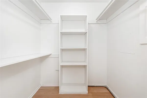 a view of an empty walk in closet