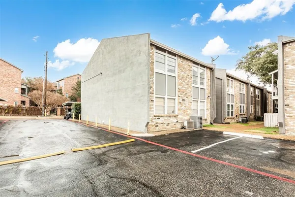 a view of a building with a street