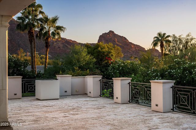 a front view of a house with a rug