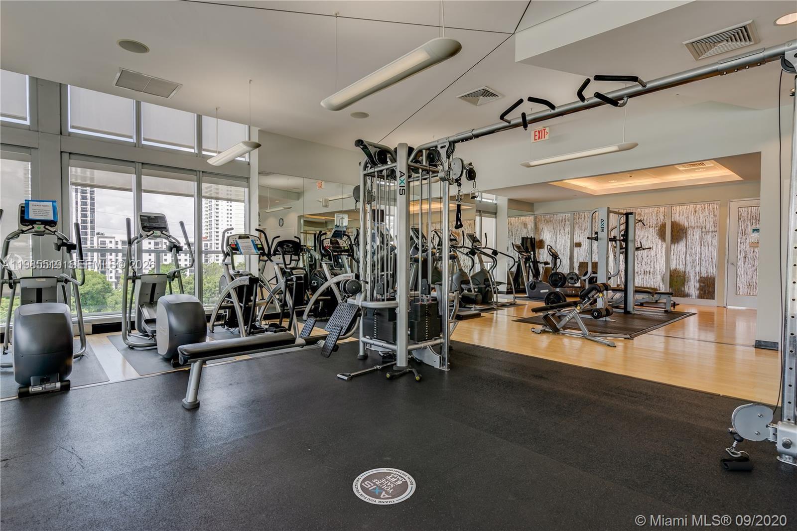 79 Southwest 12th Street, Unit 1210 Miami, FL 33130 - Photo 25 of 37 a view of a room with gym equipment