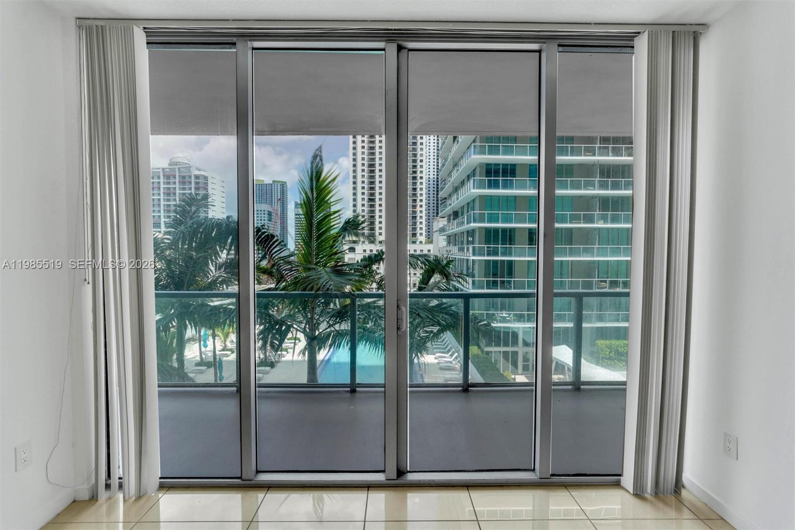 79 Southwest 12th Street, Unit 1210 Miami, FL 33130 - Photo 7 of 37 a glass door with glass window