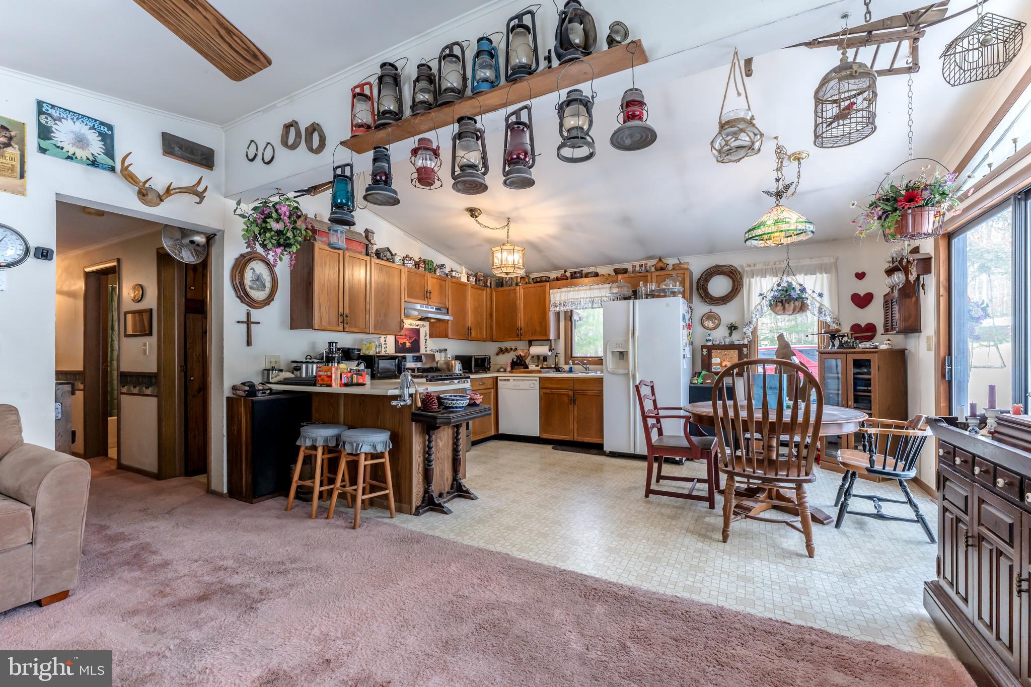 415 White Oak Road Lehighton, PA 18235 - Photo 18 of 45 a area with lots of chairs and furniture