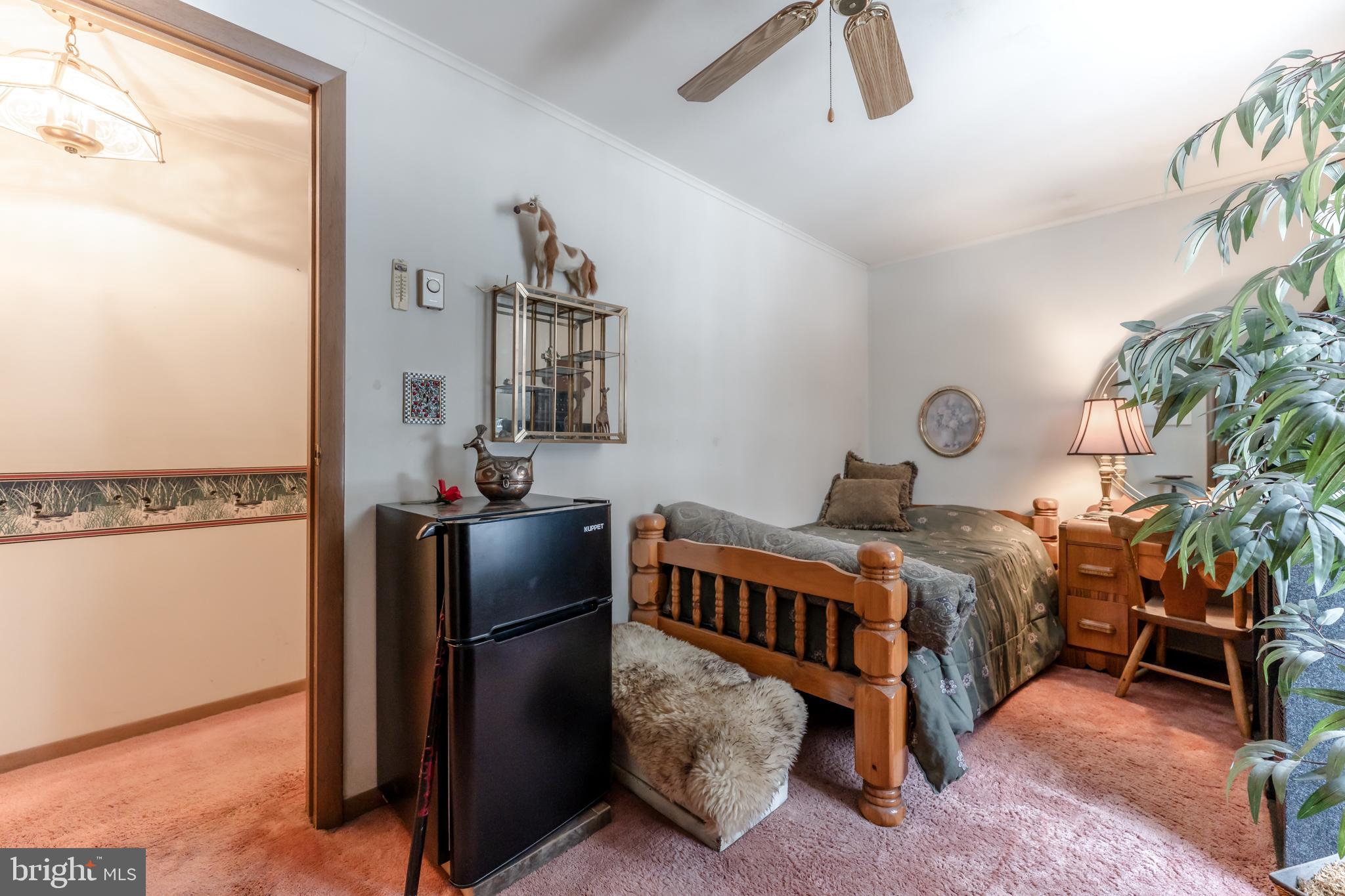 415 White Oak Road Lehighton, PA 18235 - Photo 24 of 45 a bedroom with furniture and a window