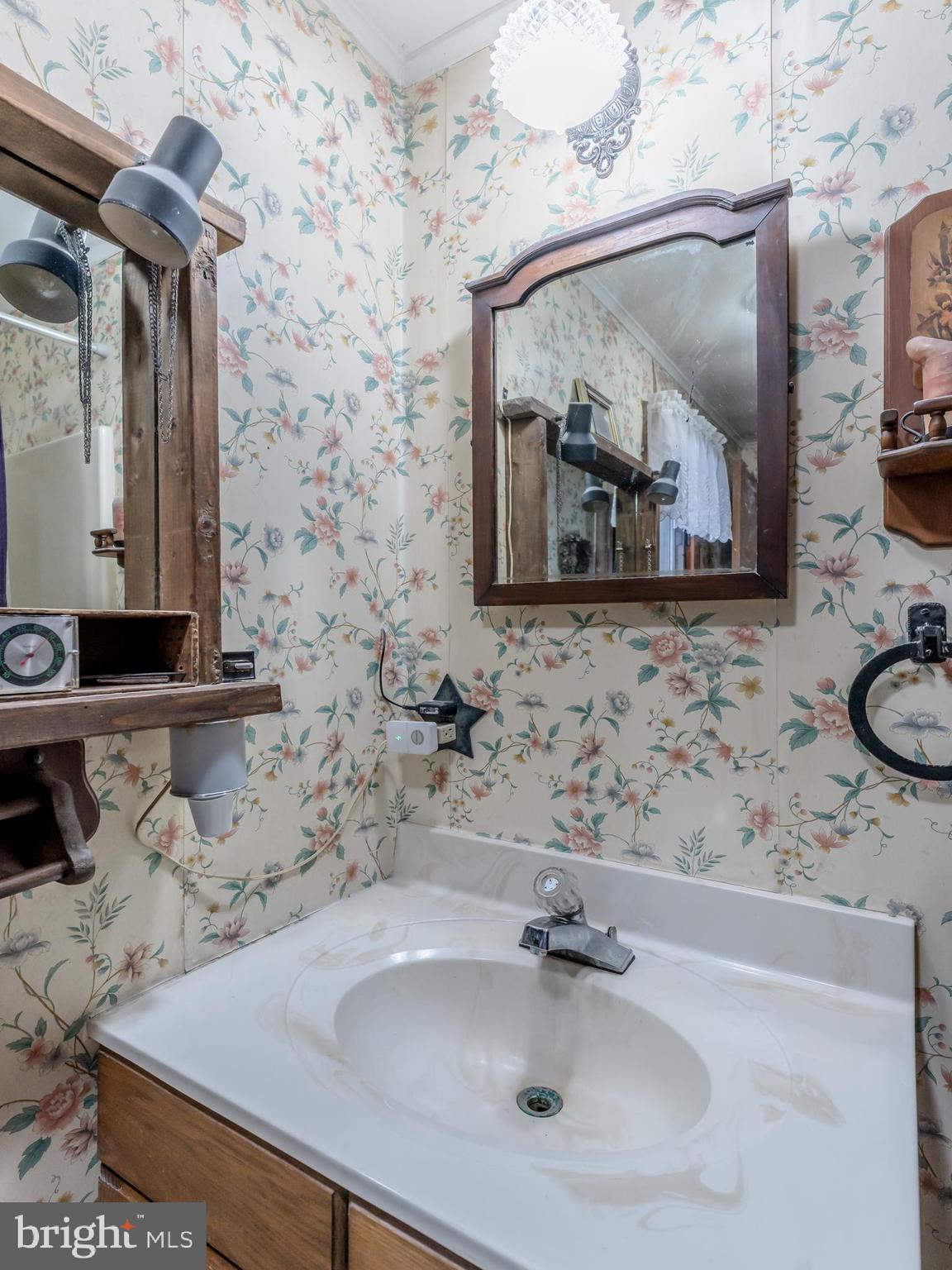 415 White Oak Road Lehighton, PA 18235 - Photo 31 of 45 a bathroom with a sink and a mirror