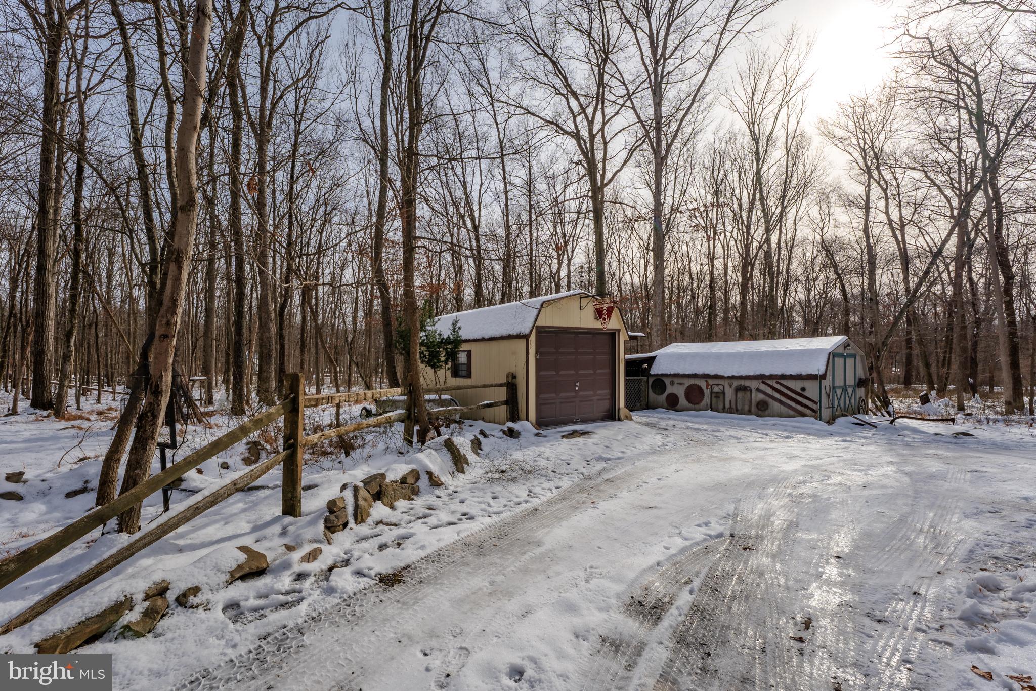 415 White Oak Road Lehighton, PA 18235 - Photo 36 of 45 a view of backyard with a table and chairs and a barbeque