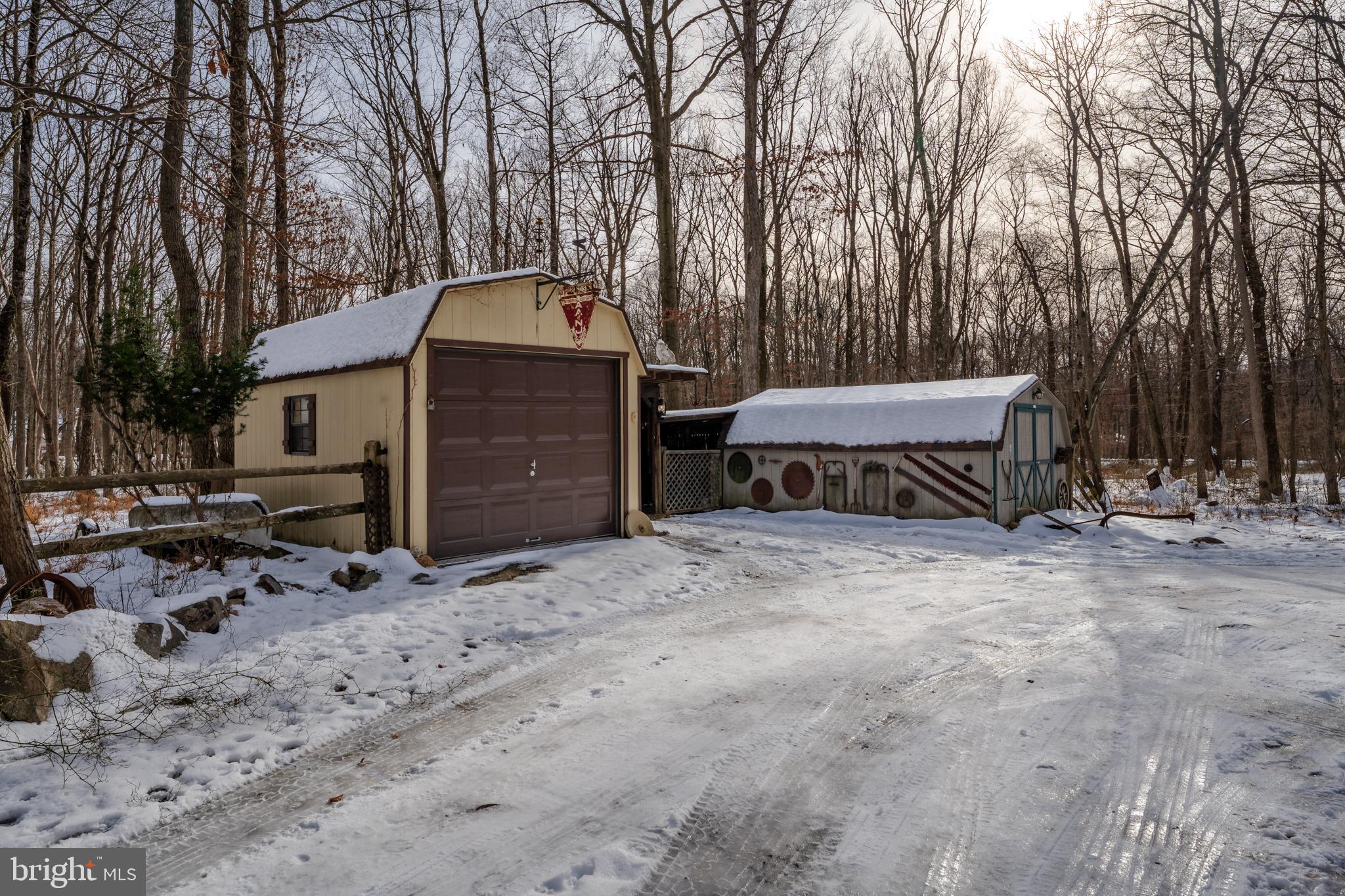 415 White Oak Road Lehighton, PA 18235 - Photo 37 of 45 a view of a house with a yard covered with snow in a backyard