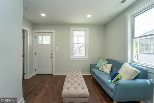 a living room with furniture and window