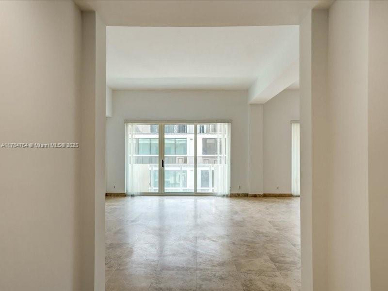 9499 Collins Avenue, Unit PH03 Surfside, FL 33154 - Photo 13 of 82 a view of an empty room with a window