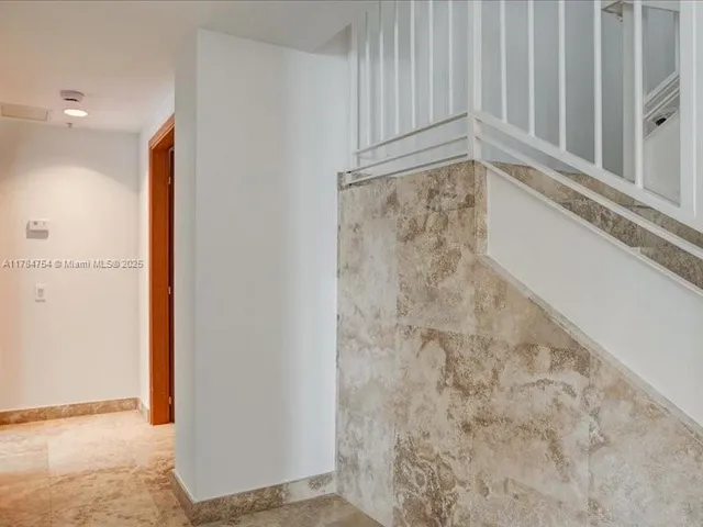 a view of an entryway with a window