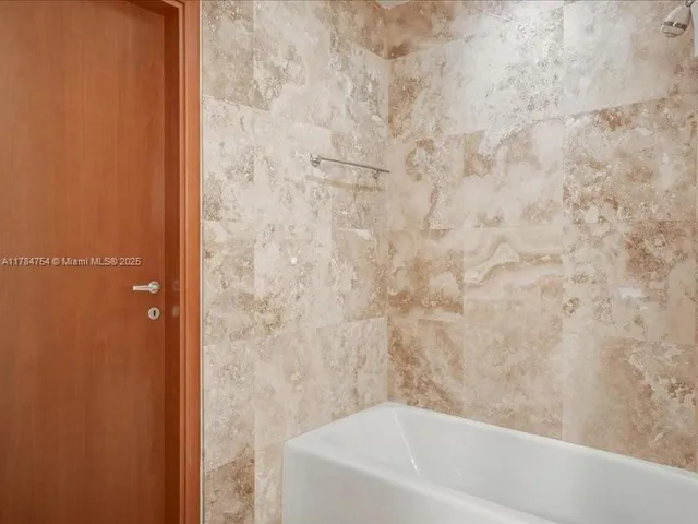 a view of a city with tall buildings