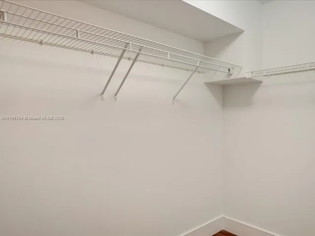 a view of a lake with a city