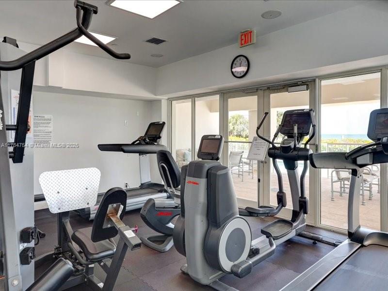 9499 Collins Avenue, Unit PH03 Surfside, FL 33154 - Photo 59 of 82 a view of a room with gym equipment