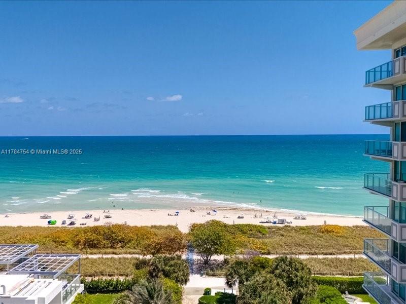 9499 Collins Avenue, Unit PH03 Surfside, FL 33154 - Photo 79 of 82 a view of an ocean and beach