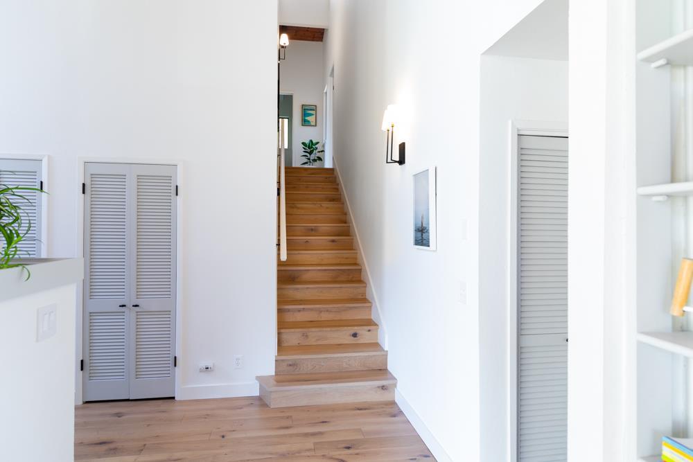 390 Brooktree Ranch Road Aptos, CA 95003 - Photo 16 of 31 a view of a hallway with wooden floor and entryway