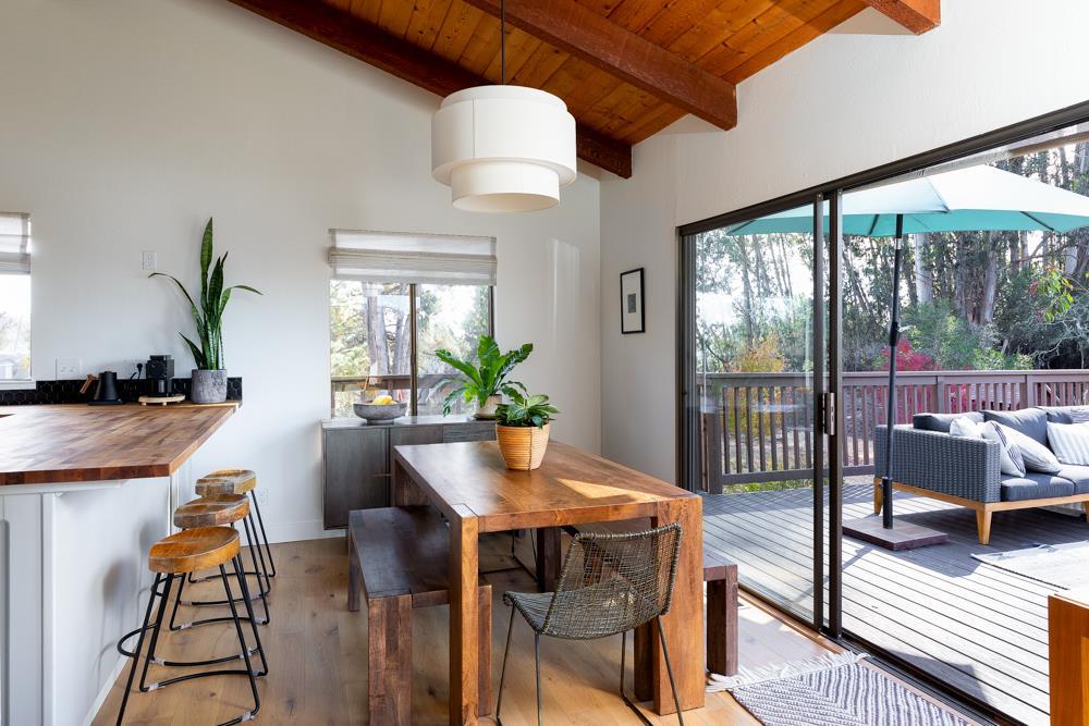 390 Brooktree Ranch Road Aptos, CA 95003 - Photo 10 of 31 a view of a dining room with furniture window and wooden floor