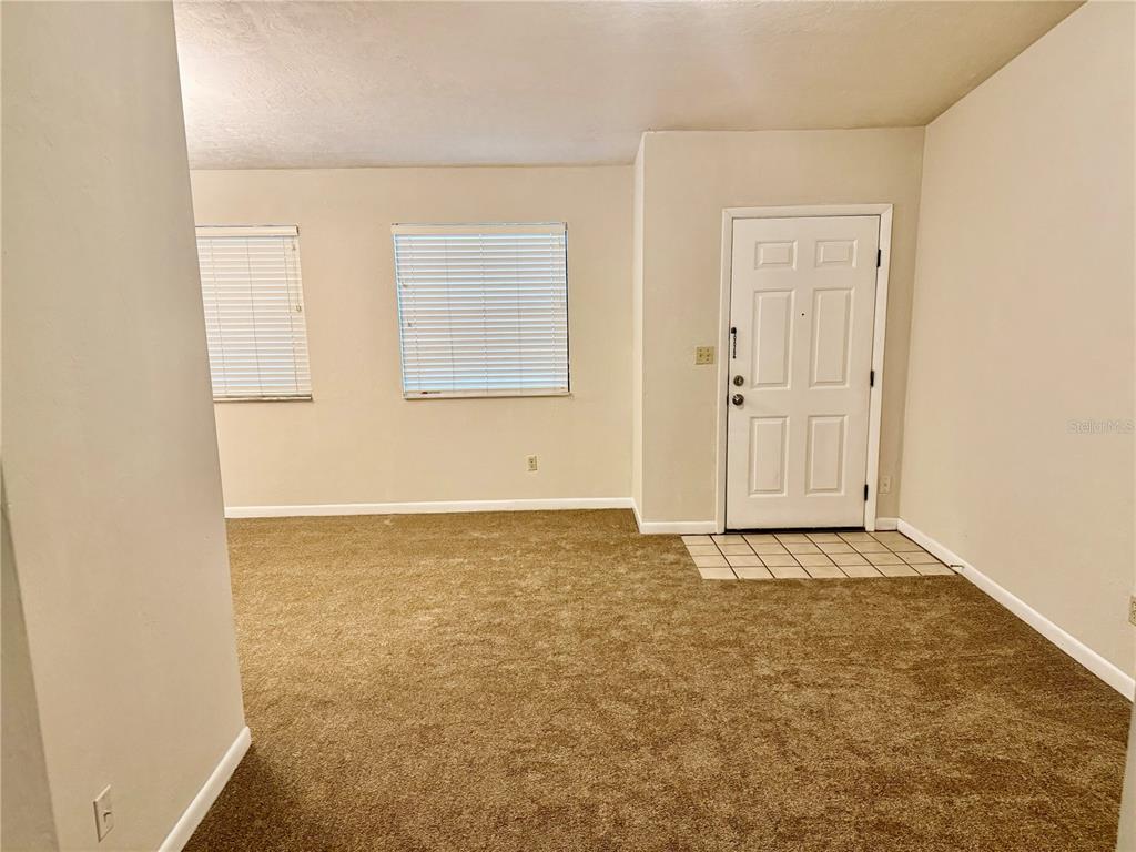 6745 Southwest 45th Avenue Gainesville, FL 32608 - Photo 3 of 12 a view of an empty room